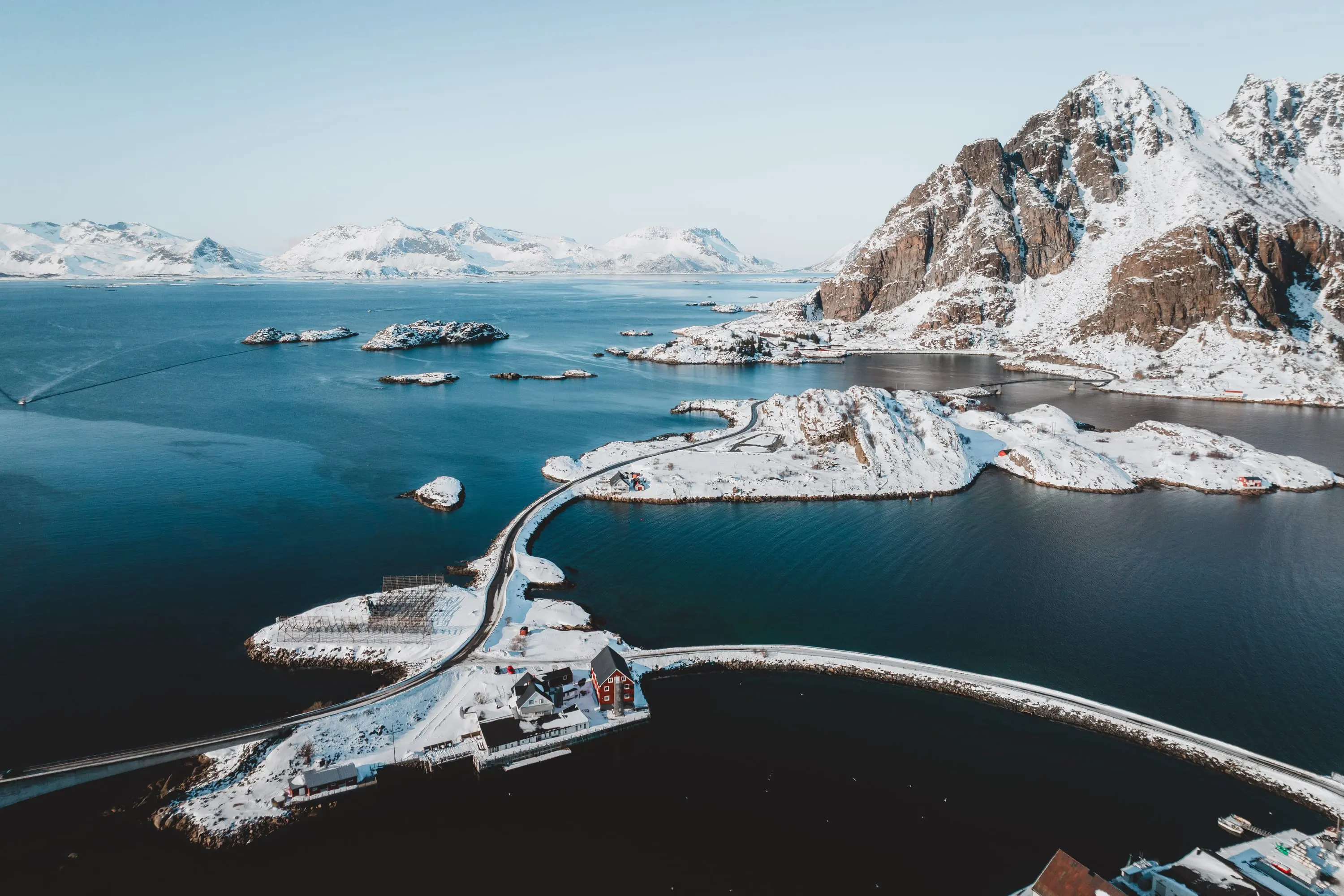 Aerial view of the Lofoten islands above turquoise water