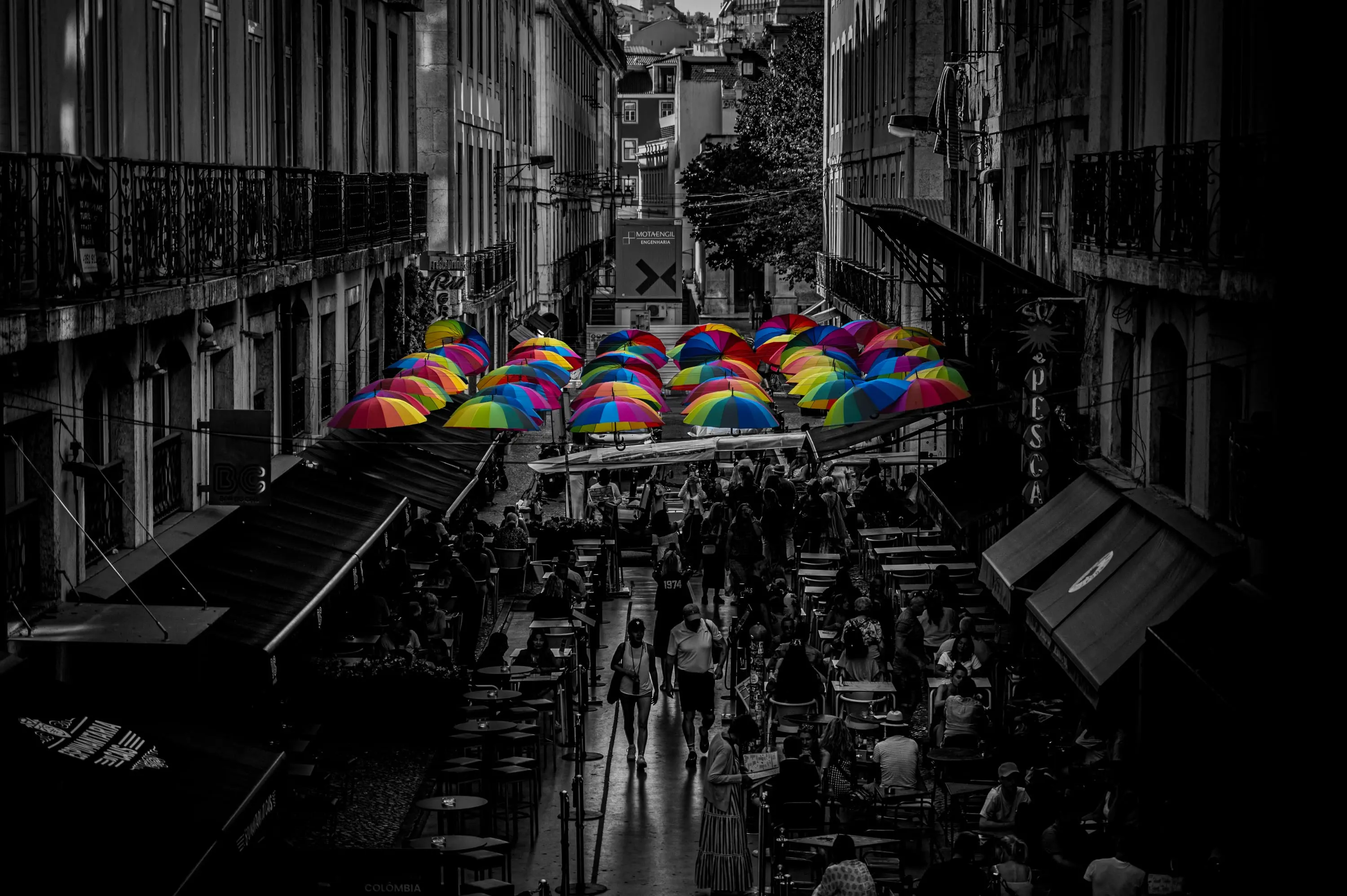 Pink Street in Lisbon with hanging umbrellas